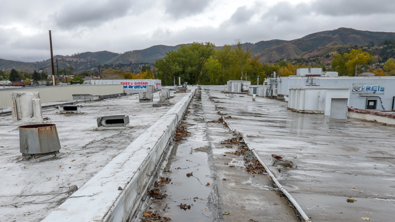Commercial Roof Drainage Mistakes That Could Be Costing You Thousands